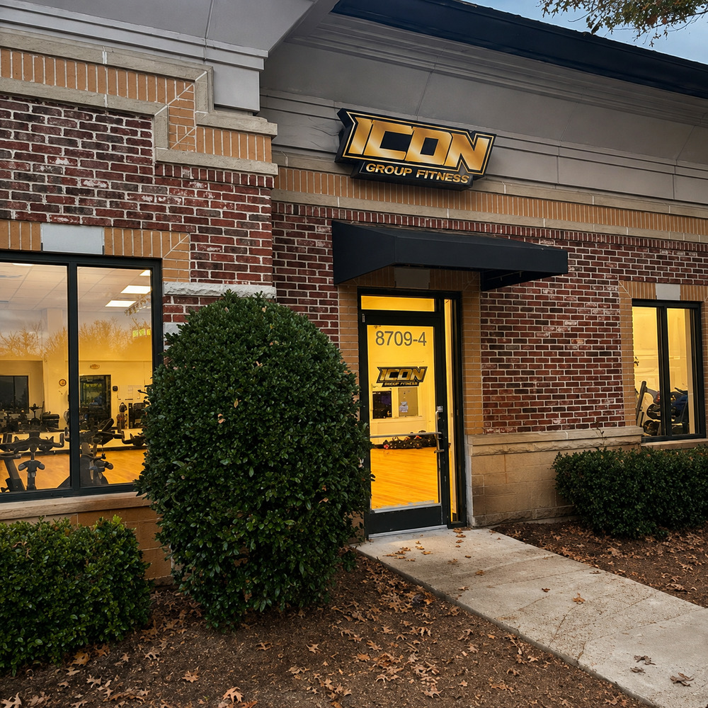 Brick storefront with a glass entrance